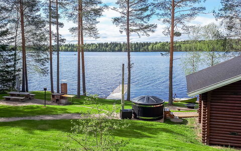 Nurmirinne: Cottage, Garden, Lawn, Garden Buildings, Yard, Log Cabin, Shade, Landscaping, Backyard, Deck