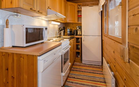 Nurmirinne: Wood, Kitchen, Flooring, Interior Design, Major Appliance, Floor, Furniture, Countertop, Wood Stain, Cabinetry