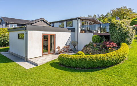 Martti - 200M from the Sea: Shrub, Garden, Roof, Home, Cottage, Garden Buildings, Yard, Landscaping, Estate, Backyard