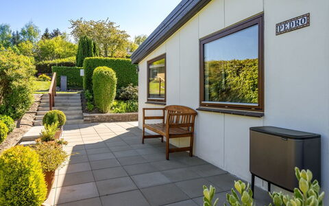 Martti - 200M from the Sea: Shrub, Garden, Cottage, Landscaping, Flowerpot, Houseplant, Yard, Backyard, Garden Buildings