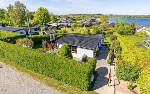 Martti - 200M from the Sea: Residential Area, House, Landscape, Home, Roof, Suburb, Landscaping, Estate, Garden, Hedge