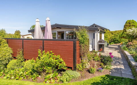 Martti - 200M from the Sea: Shrub, Garden, Home, Door, Yard, Shade, Landscaping, Cottage, Backyard, Garden Buildings