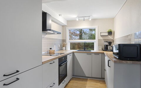 Elaina - 290M from the Sea: Kitchen, Kitchen Appliance, Countertop, Major Appliance, Cabinetry, Interior Design, Wood, Flooring, Home Appliance, Kitchen Stove