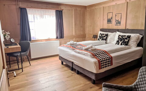 Klosters 50: Furniture, Interior Design, Flooring, Bedroom, Floor, Ceiling, Bed Sheet, Bed, Room, Table