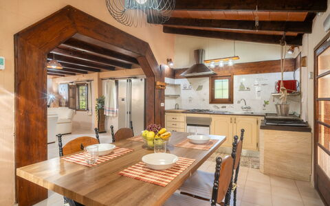 Sa Torreta: Furniture, Interior Design, Flooring, Floor, Wood, Ceiling, Table, Light Fixture, Chair, Kitchen