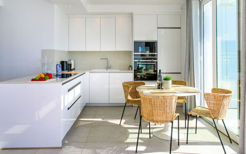 Nerja View Free Sauna and Spa: Furniture, Interior Design, Flooring, Floor, Kitchen, Countertop, Cabinetry, Wood, Chair, Ceiling