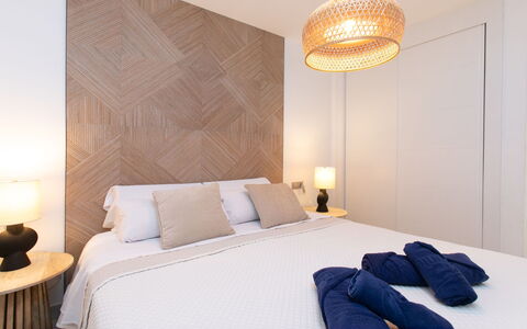 Nerja View with Infitinity Pool: Bed, Furniture, Interior Design, Bedroom, Bedding, Wall, Bed Sheet, Floor, Wood, Linens