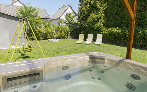 Wild Grape: Flooring, Bathtub, Swimming Pool, Plumbing Fixture, Resort, Garden, Shade, Wood Stain, Backyard
