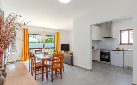 Amélia - Sunny Way: Furniture, Kitchen & Dining Room Table, Apartment, Chair, Wood Stain, Hardwood, Houseplant, Kitchen, Coffee Table