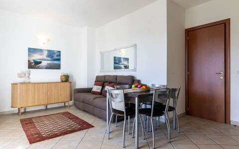 Arianna: Furniture, Interior Design, Flooring, Floor, Room, Table, Apartment, Couch, Ceiling, Living Room