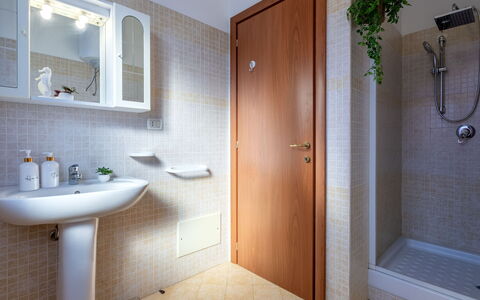 Arianna: Wall, Plumbing Fixture, Flooring, Wood, Floor, Bathroom, Interior Design, Door, Plumbing, Bathroom Sink