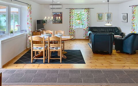Hults-Kulla: Furniture, Flooring, Floor, Wood, Interior Design, Ceiling, Wood Flooring, Table, Couch, Living Room
