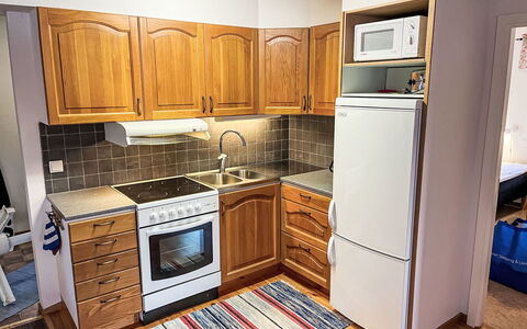 Hults-Kulla: Kitchen Appliance, Kitchen, Major Appliance, Countertop, Cabinetry, Flooring, Furniture, Wood, Floor, Kitchen Stove