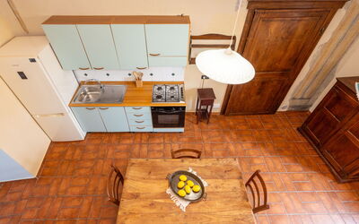 Rosa 649.3: Flooring, Wood, Floor, Interior Design, Furniture, Kitchen, Countertop, Cabinetry, Room, Apartment