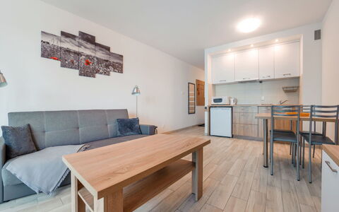 Bursztynowe Osiedle: Furniture, Chair, Table, Apartment, Outdoor Furniture, Balcony, Kitchen & Dining Room Table, Condominium, Shade, Patio