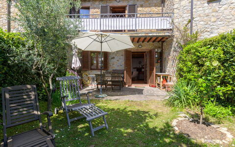 Steffi'S House: House, Shrub, Residential Area, Door, Home, Garden, Outdoor Furniture, Cottage, Flowerpot