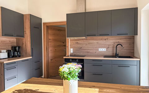 Leitner: Furniture, Kitchen, Countertop, Cabinetry, Interior Design, Flooring, Kitchen Appliance, Wood, Floor, Major Appliance