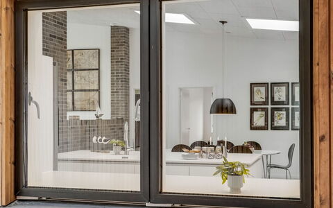 Nico - 1.4Km from the Sea: Interior Design, Glass, Natural Material, Hardwood, Wood Stain, Home Door, Houseplant, Daylighting, Chair, Living Room