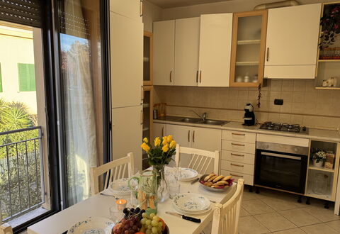 Al Civico 80: Furniture, Flooring, Wood, Interior Design, Kitchen Appliance, Kitchen, Floor, Major Appliance, Kitchen & Dining Room Table, Countertop