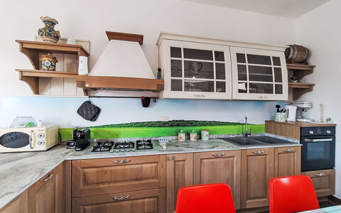 Scrusciu Do Vientu: Kitchen, Wood, Countertop, Major Appliance, Furniture, Interior Design, Cabinetry, Flooring, Kitchen Appliance, Home