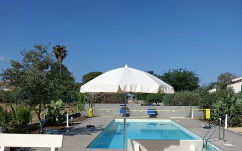 Scrusciu Do Vientu: Swimming Pool, Umbrella, Outdoor Furniture, Shade, Furniture, Resort, Composite Material, Sunlounger, Chair, Leisure