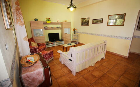 Villa Floridia: Furniture, Interior Design, Flooring, Wood, Floor, Room, Couch, Lighting, Living Room, Picture Frame