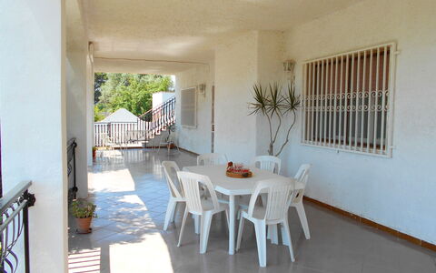 Villa Floridia: Furniture, Floor, Flooring, Chair, Porch, Balcony, Ceiling, Shade, Outdoor Furniture, Kitchen & Dining Room Table