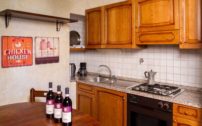 Torre Suite Balc: Kitchen, Countertop, Kitchen Appliance, Major Appliance, Cabinetry, Wood, Furniture, Interior Design, Flooring, Room