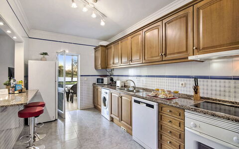 Manelito House - Sunny Way: Kitchen, Countertop, Flooring, Kitchen Appliance, Major Appliance, Cabinetry, Interior Design, Floor, Home, Ceiling