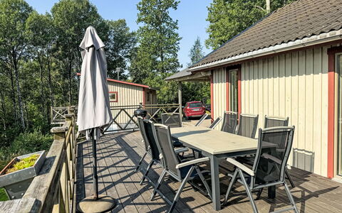 Liane 3: Wood, Cottage, Porch, Hardwood, Deck, Shade, Wood Stain, Chair, Siding, Plank