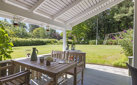 Franke - 1.2Km from the Sea: Furniture, Wood, Porch, Outdoor Furniture, Table, Chair, Flooring, Shade, Floor, Outdoor Table