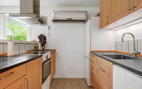 Ensio - 1.2Km from the Sea: Countertop, Kitchen, Cabinetry, Kitchen Appliance, Flooring, Interior Design, Kitchen Sink, Major Appliance, Furniture, Wood