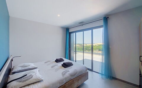 Villa Dune: Bedroom, Bed, Interior Design, Furniture, Bed Sheet, Floor, Bedding, Ceiling, Lighting, Room