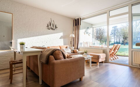Beach House Bruinisse: Furniture, Interior Design, Flooring, Wall, Floor, Wood, Ceiling, Living Room, Couch, Room
