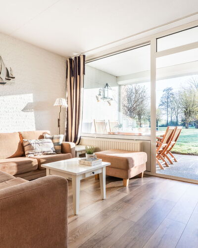 Beach House Bruinisse: Furniture, Interior Design, Wood, Ceiling, Flooring, Couch, Living Room, Apartment, Floor, Room