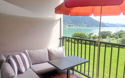 Studio Landskron Seezugang: Mountainous Landforms, Furniture, Hill, Outdoor Furniture, Mountain Range, Chair, Coast, Balcony, Shade, Lawn