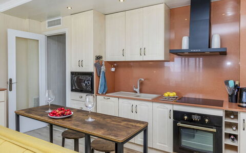 Xaloc: Furniture, Countertop, Kitchen, Kitchen Appliance, Cabinetry, Major Appliance, Interior Design, Flooring, Wood, Floor