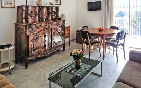 Les Jardins de L'Ermitage: Furniture, Interior Design, Flooring, Room, Floor, Table, Lighting, Picture Frame, Home, Chair