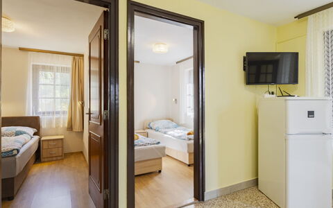 Leslie: Interior Design, Room, Floor, Furniture, Bedroom, Bed, Flooring, Ceiling, Apartment, Bed Frame