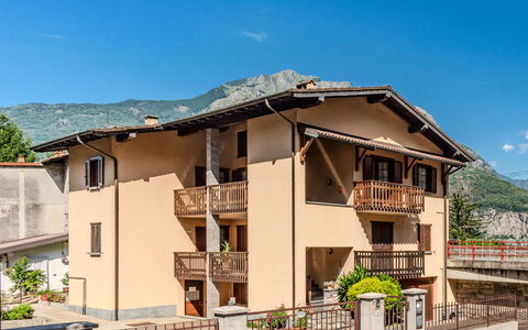 House Bigio: Residential Area, Home, Balcony, Human Settlement, Door, Apartment, Mountain Range, Suburb, Porch, Mountain Village