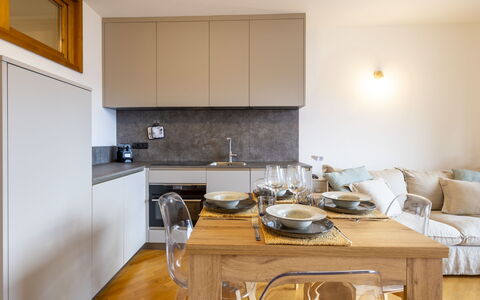 Baita Bucaneve: Furniture, Kitchen, Kitchen Appliance, Interior Design, Countertop, Flooring, Wall, Cabinetry, Major Appliance, Wood