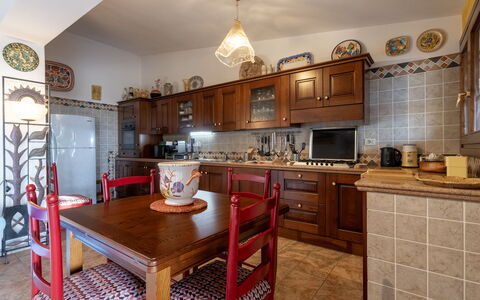 Casanova: Furniture, Kitchen, Interior Design, Cabinetry, Flooring, Countertop, Wood, Room, Kitchen Appliance, Floor
