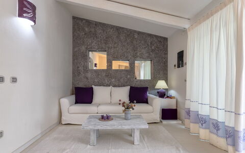 Nanni: Furniture, Interior Design, Wall, Flooring, Couch, Floor, Room, Ceiling, Living Room, Apartment