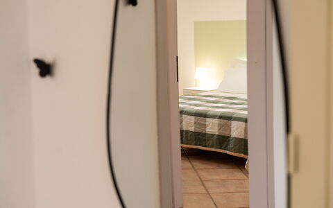 Villa Ninfa: Interior Design, Furniture, Wall, Floor, Flooring, Wood, Bedroom, Room, Ceiling, Bed