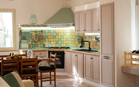 Villa Ninfa: Kitchen, Interior Design, Countertop, Furniture, Cabinetry, Kitchen Appliance, Flooring, Major Appliance, Wood, Floor