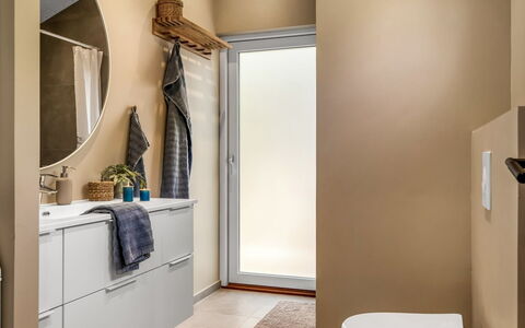 Erja - 600M from the Sea: Flooring, Floor, Interior Design, Plumbing Fixture, Toilet Seat, Toilet, Bathroom, Lighting, Room, Plumbing