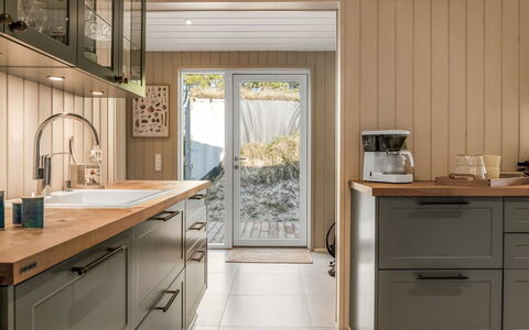 Erja - 600M from the Sea: Furniture, Countertop, Flooring, Kitchen, Cabinetry, Interior Design, Wood, Kitchen Appliance, Floor, Drawer