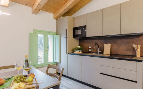 Villa Zena: Kitchen, Countertop, Interior Design, Furniture, Flooring, Wood, Kitchen Appliance, Cabinetry, Home, Major Appliance
