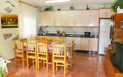 Masia del Mosso: Room, Property, Kitchen, Furniture, Building, Interior Design, Floor, Yellow, House, Dining Room