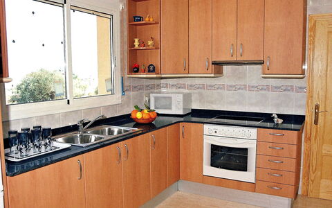Mestral: Countertop, Cabinetry, Kitchen, Room, Furniture, Property, Kitchen Stove, Major Appliance, Stove, Interior Design